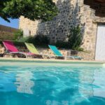 Pool and sunbathing area